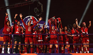 Liverpool lift Premier League trophy after hitting Chelsea for five