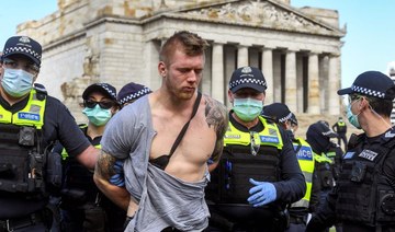 Lockdown protesters defy police as Australia coronavirus cases ease