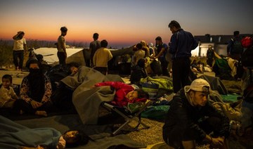 Thousands sleep in open after Greek refugee camp burns down