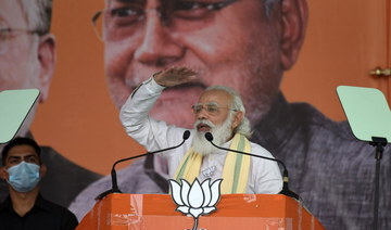 India PM Modi holds first election rally since COVID-19 outbreak