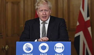 UK PM Boris Johnson locks down England as COVID-19 cases pass 1 million