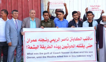 Protesters call for Houthis’ designation as a terrorist group after death of Yemeni football coach and son