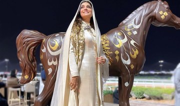 Designer Honayda Serafi attends the 2021 Saudi Cup wearing her own design. Instagram