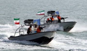 US ship fires warning shots in encounter with Iranian boats