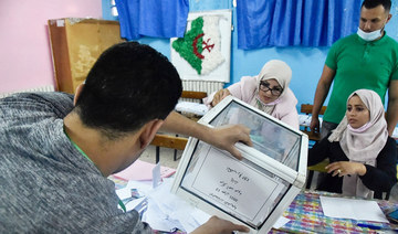 Algeria awaits results after voters snub elections