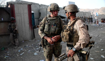 Soldier killed in Kabul airport gunfight as Taliban warn of ‘consequences’ over US withdrawal