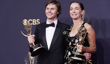 Evan Peters, left, and Julianne Nicholson pose for a photo with the awards for outstanding supporting actor and actress in a limited or anthology series or movie for "Mare of Easttown" on Sunday, Sept. 19, 2021 in Los Angeles. (AP)