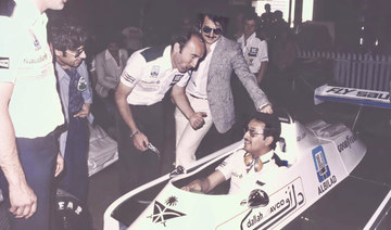 Frank Willians with Prince Fahad in a famous Saudi-sponsored Williams Formula One car of the early 1980s. (Supplied)