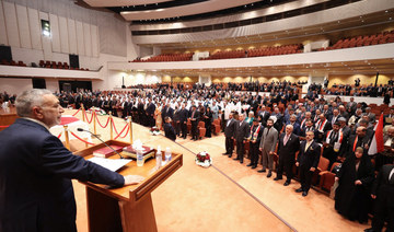 Iraqi parliament holds first session, elects speaker