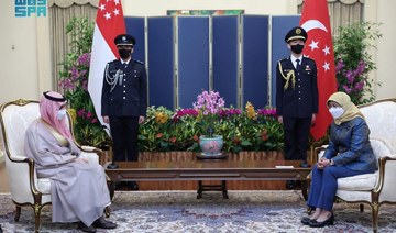 Saudi Arabian Foreign Minister Prince Faisal bin Farhan meets Singapore President Halimah Yacob. (SPA)