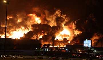 A view of a fire at Saudi Aramco's petroleum storage facility, after an attack, in Jeddah, Saudi Arabia March 25, 2022. (Reuters)