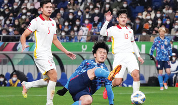 World Cup-bound Japan end on flat note with Vietnam draw