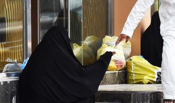 The Kingdom’s anti-begging law, which came into effect in January 2021, can enforce penalties ranging from a one-year prison sentence to a fine worth up to 100,000 SR ($26,658). (AFP/File Photo)