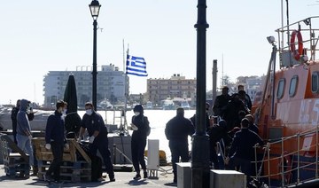 Greek police rescue 64 migrants marooned on border islet