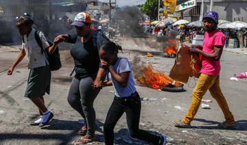 New gang fighting in Haiti kills 20, displaces thousands