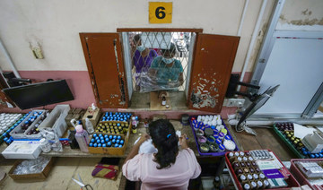 People wait to receive medical drugs at a government run hospital in Colombo, Sri Lanka, June 6, 2022. (AP)