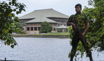 An army soldier soldier stands guard outside the parliament building in Colombo, Sri Lanka, Saturday, July 16, 2022. (AP)