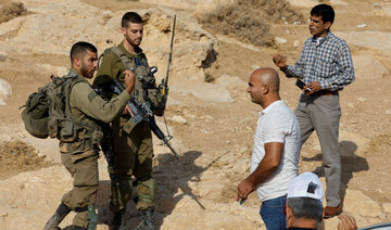 Israeli forces uproot 100 olive trees to make way for new checkpoint