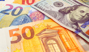 Euro back above dollar parity on US economic strains