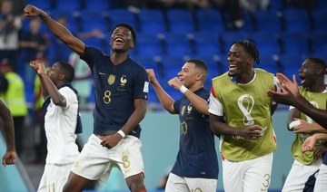 Mbappe double sinks Denmark and takes France into World Cup last 16