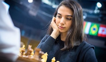 Iranian woman competes at chess tournament without hijab