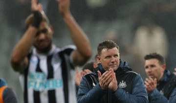 Newcastle in title race after Arsenal draw but coach remains humble