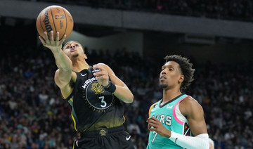 Warriors beat Spurs before NBA-record 68,323 at Alamodome