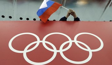 Russian Olympic chief says athletes must compete without restrictions