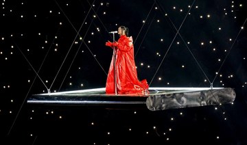  Rihanna dons custom Alaia coat for Super Bowl performance, reveals pregnancy 