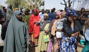 Nigerians vote for new president in tight election race