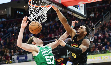 Cavs hand Celtics third straight defeat in overtime, Sixers roll on