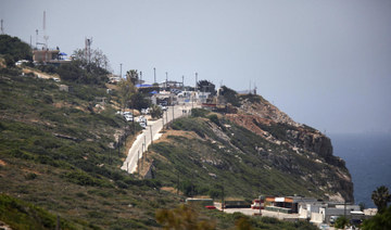 At Lebanon border, Israeli minister vows reprisal for rare bomb attack