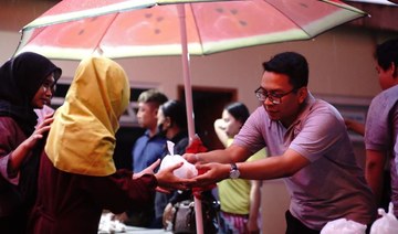 Indonesian Buddhists step out to support Muslims in Ramadan fast 