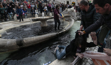 Climate activists turn landmark Rome fountain black