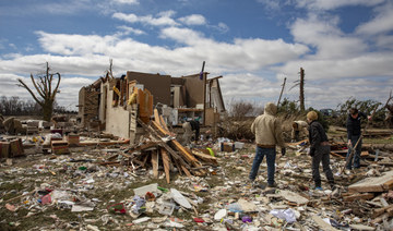 At least 26 dead after tornadoes rake US Midwest, South