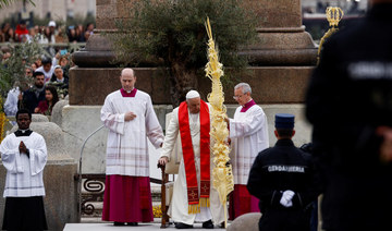 Pope Francis leads Palm Sunday service, bounces back from illness