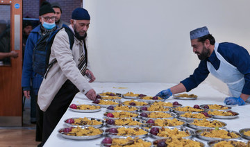 People arrive at the East London Mosque ahead of sunset to break their fasts. (Salman Farsi/East London Mosque)