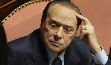 Italian ex-leader Berlusconi hospitalized in ICU, but alert