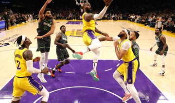 LeBron James leads Lakers into playoffs after thriller, Hawks advance