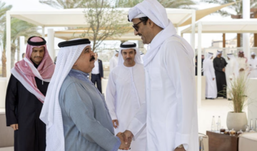 King of Bahrain Hamad bin Isa Al-Khalifa greets Emir of Qatar Sheikh Tamim bin Hamad Al-Thani at St Regis Saadiyat, Abu Dhabi.