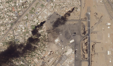 This satellite photo from Planet Labs PBC shows fires burning at Khartoum International Airport in Khartoum, Sudan, Wednesday.