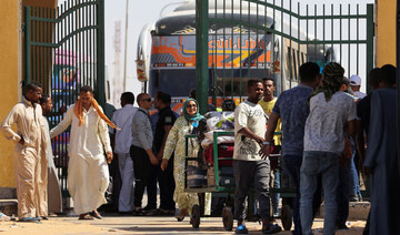 Sudanese fleeing clashes flood port city, borders with Egypt