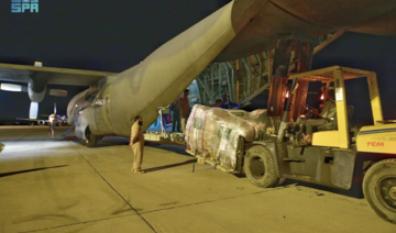 The fifth Saudi plane carrying aid for Sudanese people arrives at Port Sudan International Airport on Thursday. (SPA)