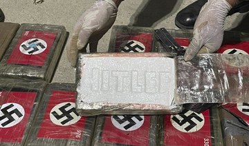 Police in northern Peru port seize cocaine packets with Nazi flag printed on the outside