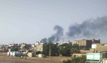 Smoke rises over Khartoum on Friday as clashes between warring factions resumed in Sudan’s capital. (AP)