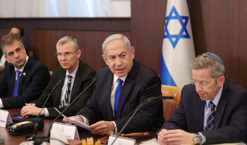 Israeli Prime Minister Benjamin Netanyahu (2-R) attends the weekly cabinet meeting in his office in Jerusalem, on June 25, 2023.