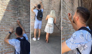 Viral video of man carving name on Rome’s Colloseum prompts calls for crackdown vs tourist vandals