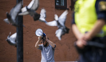 Salwan Momika protests outside a mosque in Stockholm on June 28, 2023, during the Eid Al-Adha holiday. (AFP)