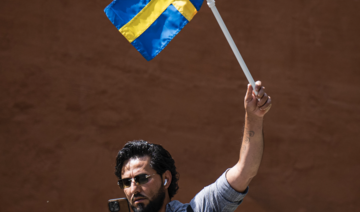 Salwan Momika protests outside a mosque in Stockholm on June 28, 2023, during the Eid Al-Adha holiday. (AFP)