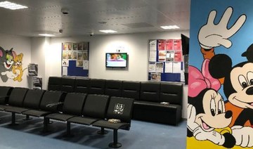 UK immigration minister orders removal of cartoon murals at children asylum seeker center